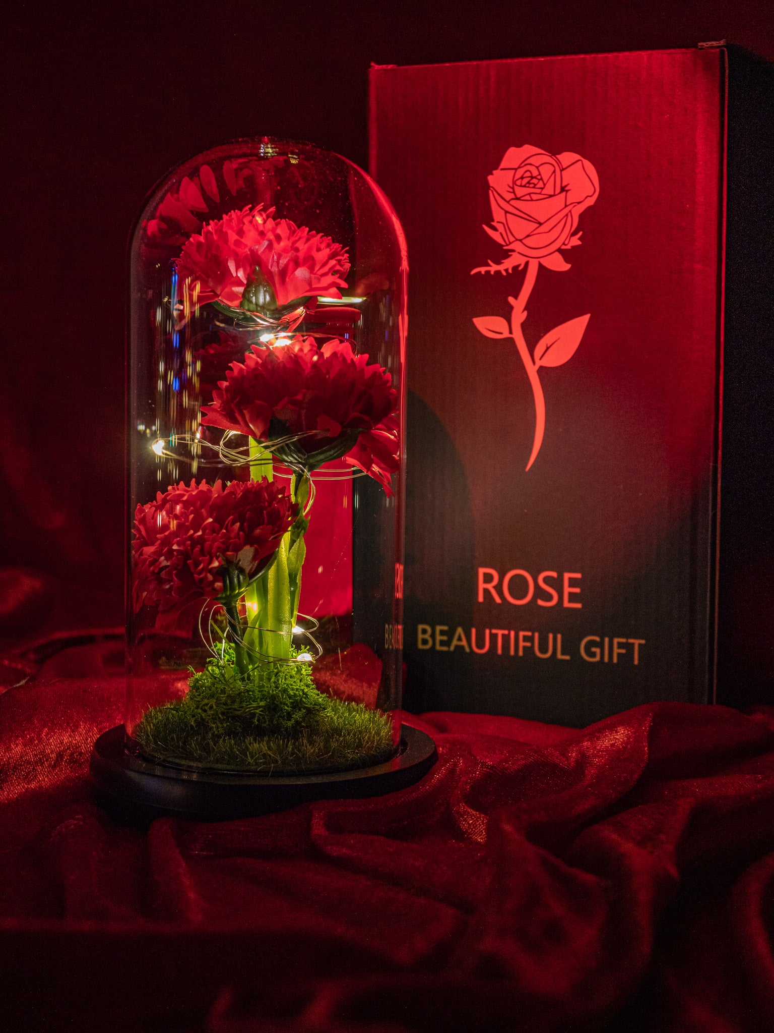 Potrójny czerwony bukiet na leśnym mchu